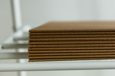 Stacked fiberboard protection sheets