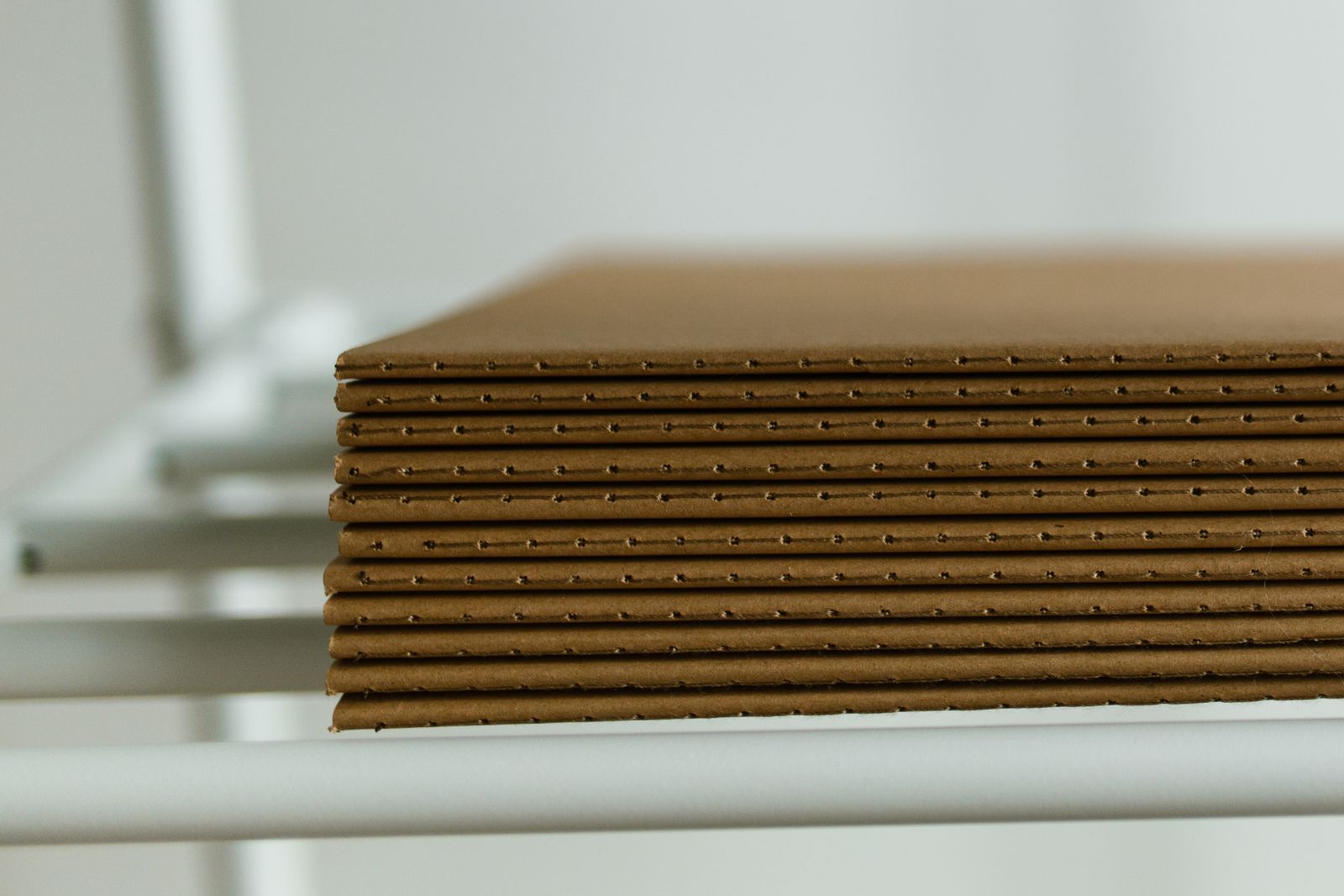 fiberboard-protection-photo Stacked fiberboard protection sheets